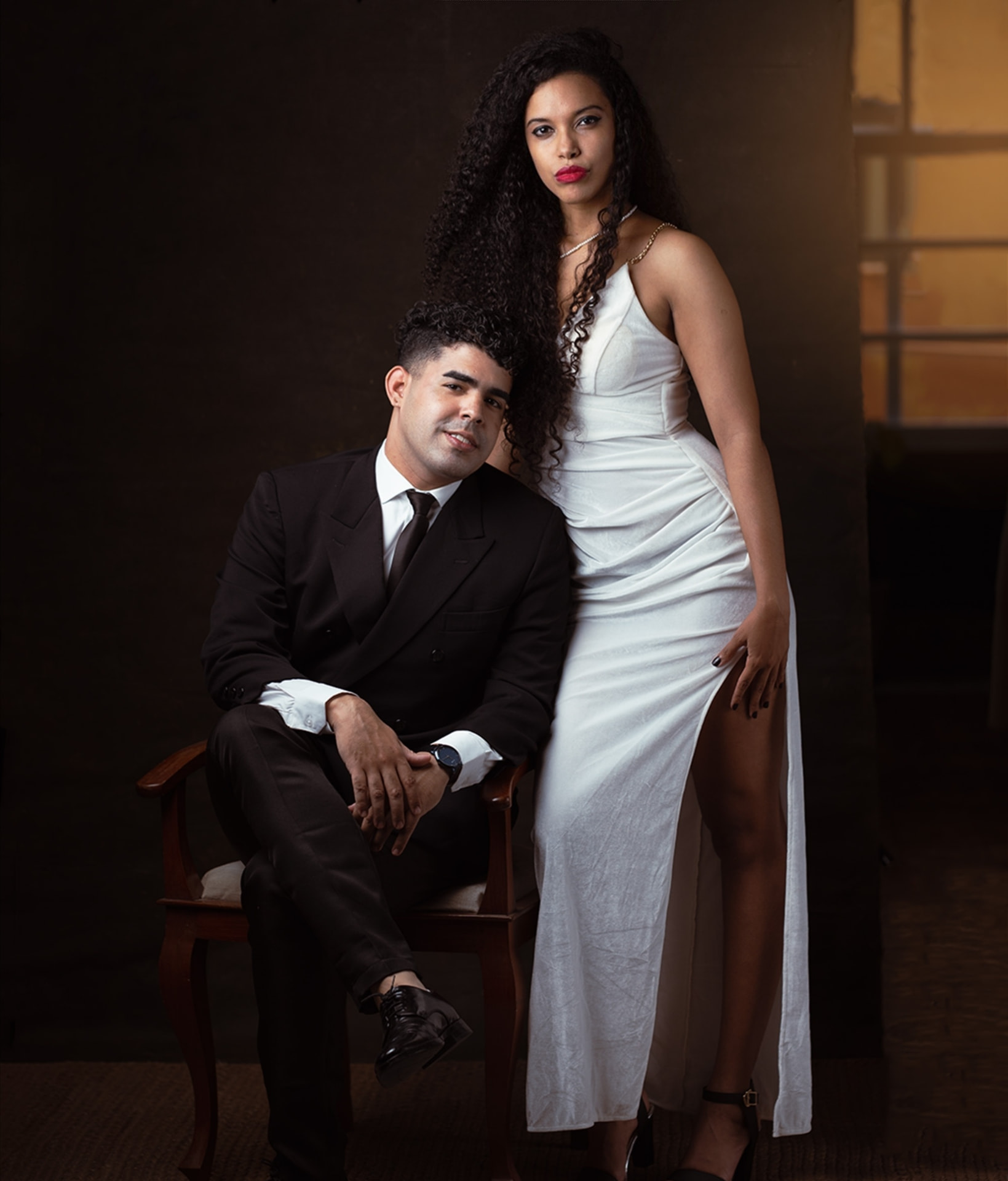 Qband Royal duo in black tie and white evening gown